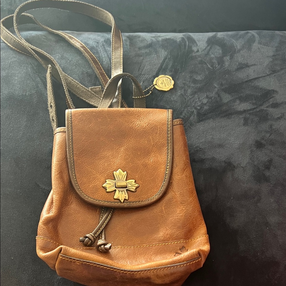 Vintage Tan Leather Backpack with Floral Accent